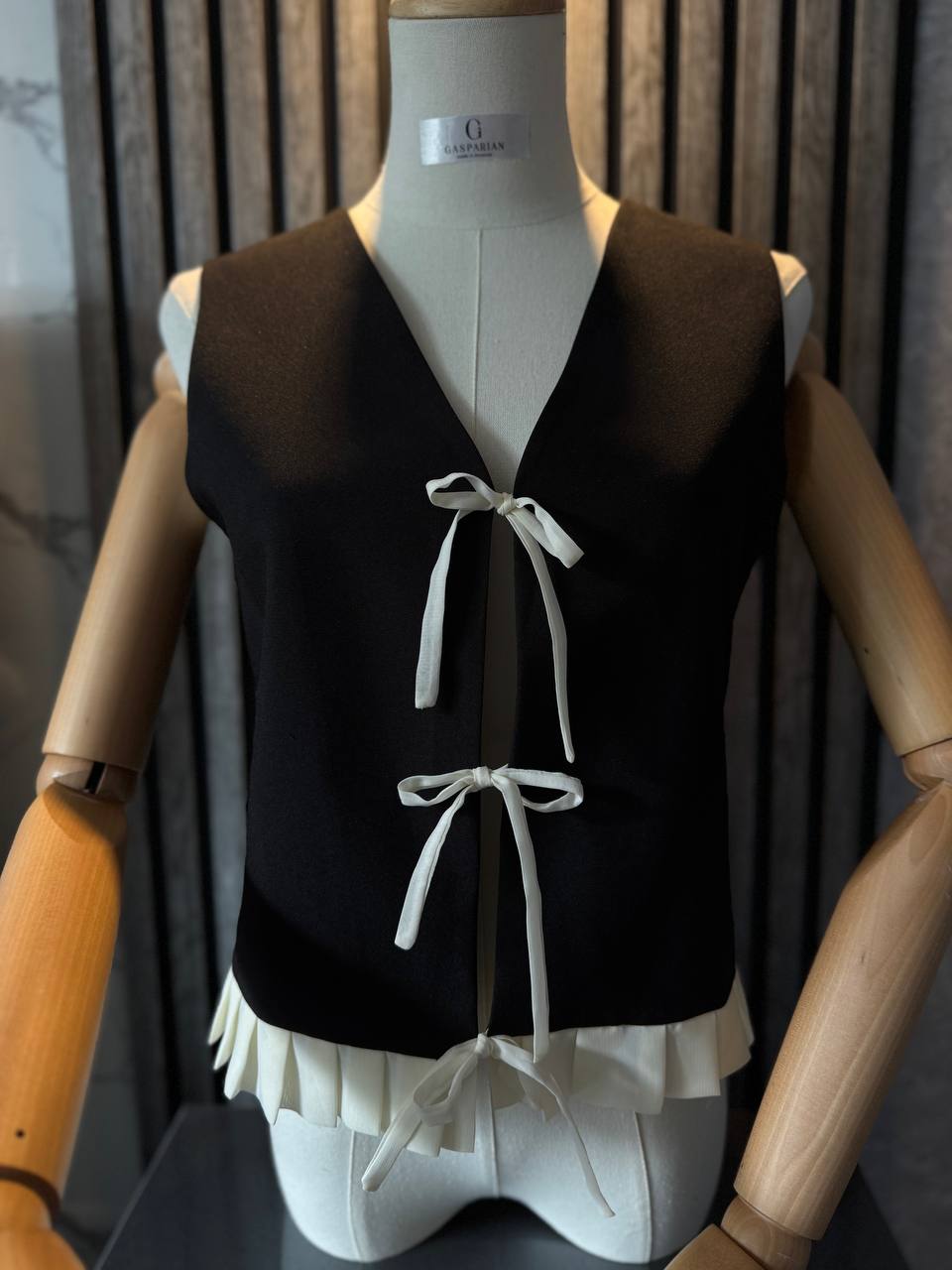 Black Sleeveless Bow Top with Pleated Hem